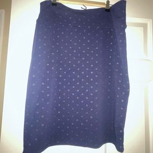 LaLaRoe Cassie navy blue pencil skirt with gold sparkle dots.